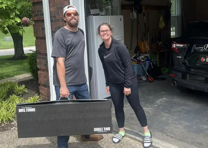 delivering a shingle tomb to a customer
